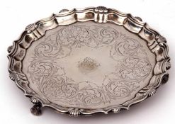 George II waiter of shaped circular design with wavy and shell edge, later foliate engraved centre