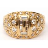 Mixed cut diamond cluster ring, the centre decorated with six graduated baguette cut diamonds, the