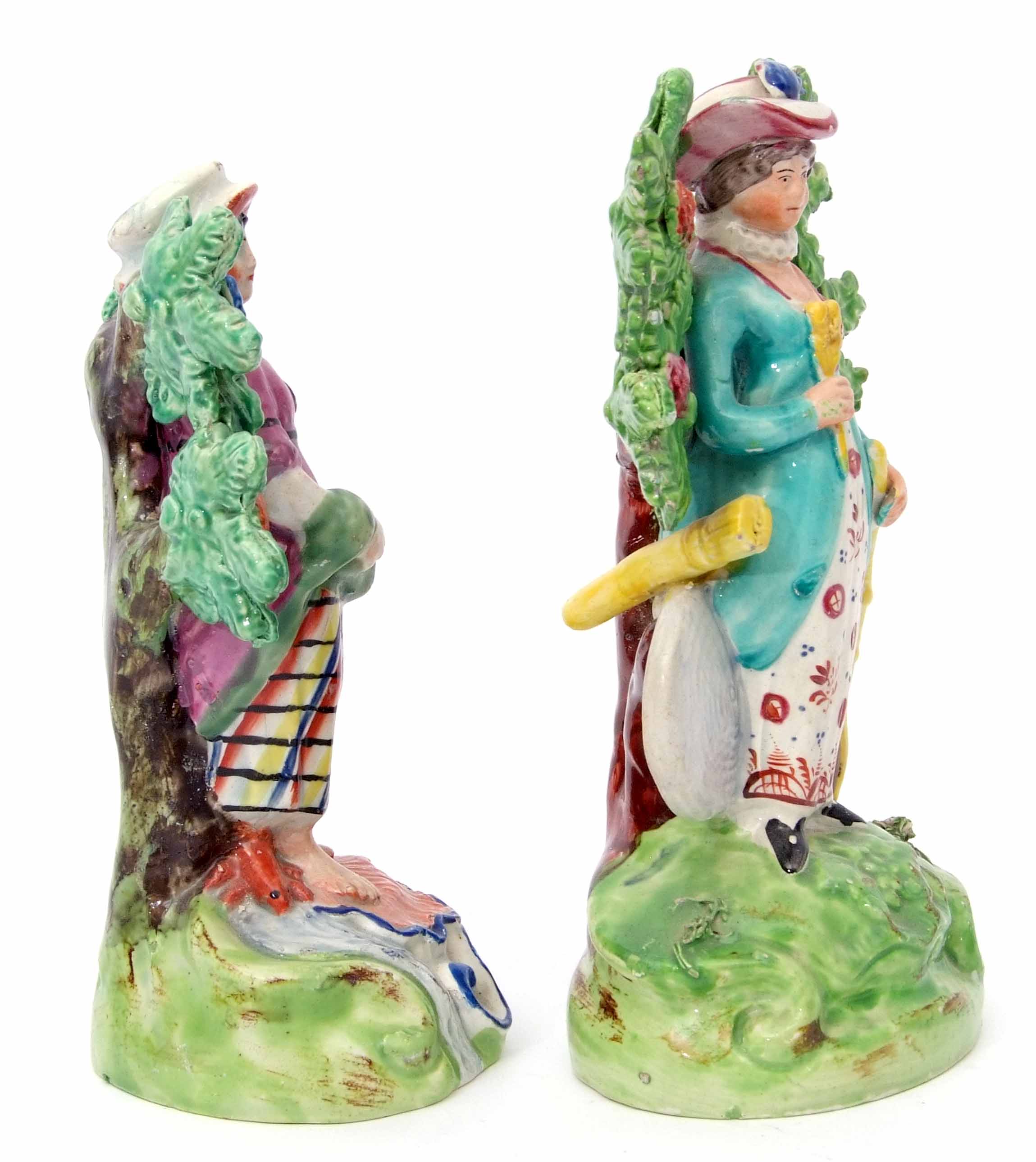 Two Walton type Staffordshire figures, circa 1840, standing against bocage, one of a fish seller, - Image 4 of 5