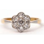 Diamond cluster ring featuring seven brilliant cut diamonds, the principal diamond 0.15ct approx,