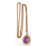 Antique amethyst and seed pearl pendant, the oval shaped faceted amethyst within a seed pearl