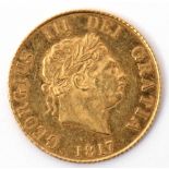 George III gold half sovereign dated 1817, Laureate head right, with date below, verso with a crown,