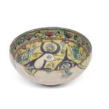 Nishapur pottery bowl, Persian, probably 9th/10th century, the bowl decorated in black, green and