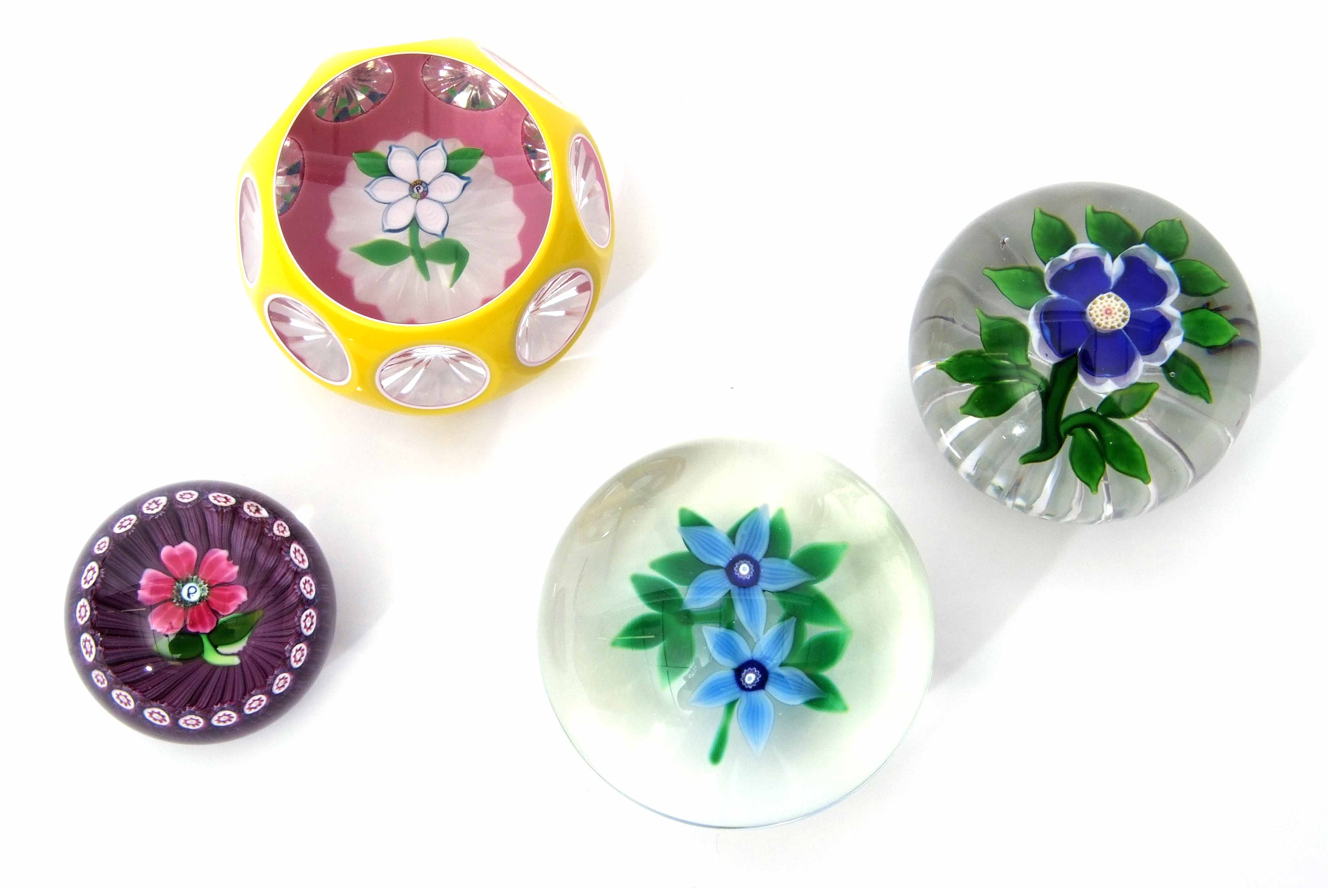 Group of four paperweights including a Baccarat primrose weight with a blue flower with white - Image 2 of 8