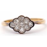 Art Deco diamond cluster ring, a shaped oval design featuring nine single cut diamonds, stamped