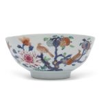 Early 18th century Chinese export punch bowl, decorated in enamels with a bird perched on branches