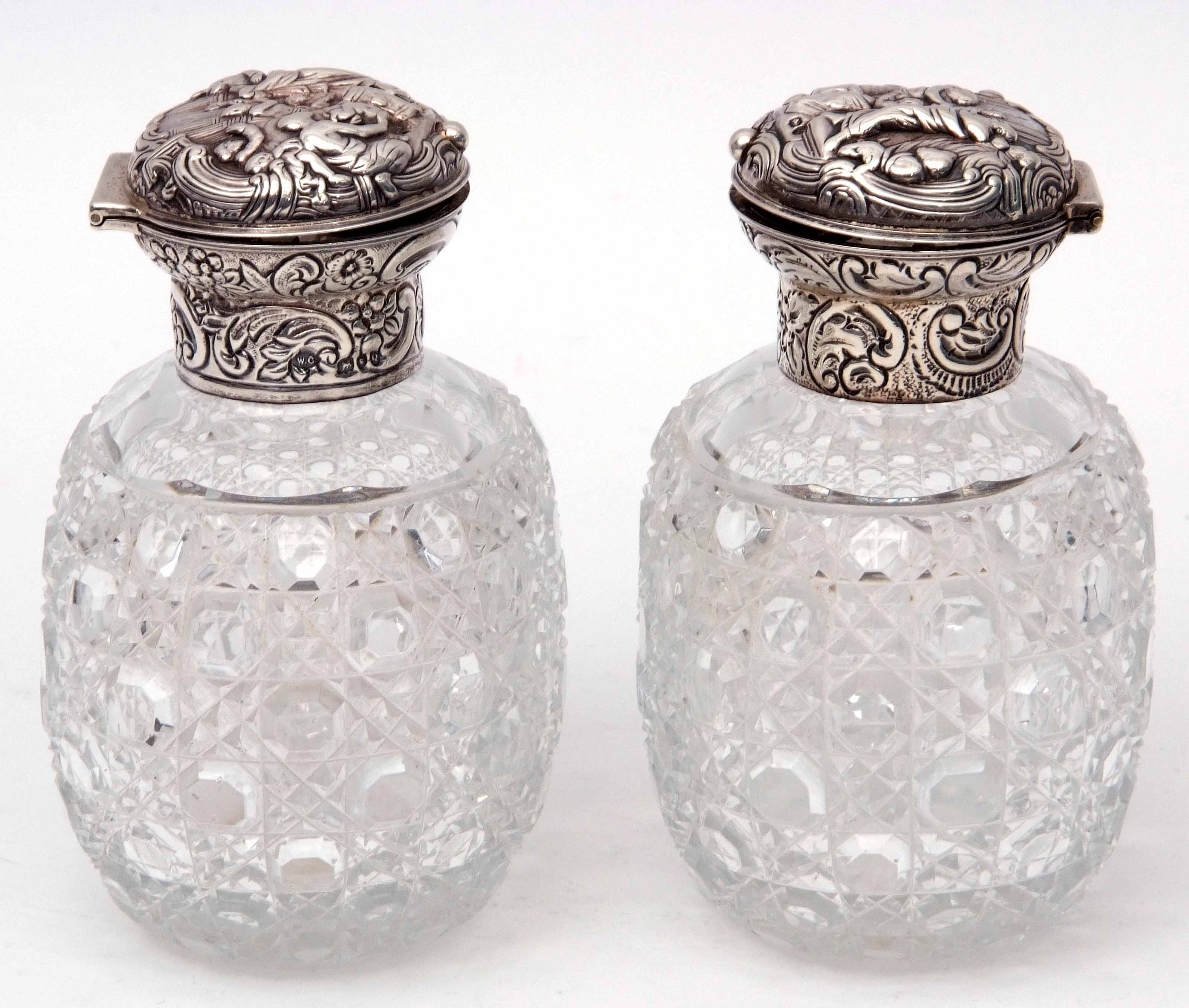 Pair of late Victorian hobnail cut oval glass scent bottles, the hinged lids and collars heavily - Image 2 of 5