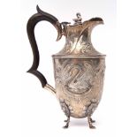 Edward VII Irish hot water jug of vase shape with card cut rim, heavily embossed with swans,
