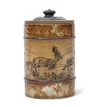 Doulton Lambeth tobacco jar and a cover, the jar with an incised design of deer on buff ground, by