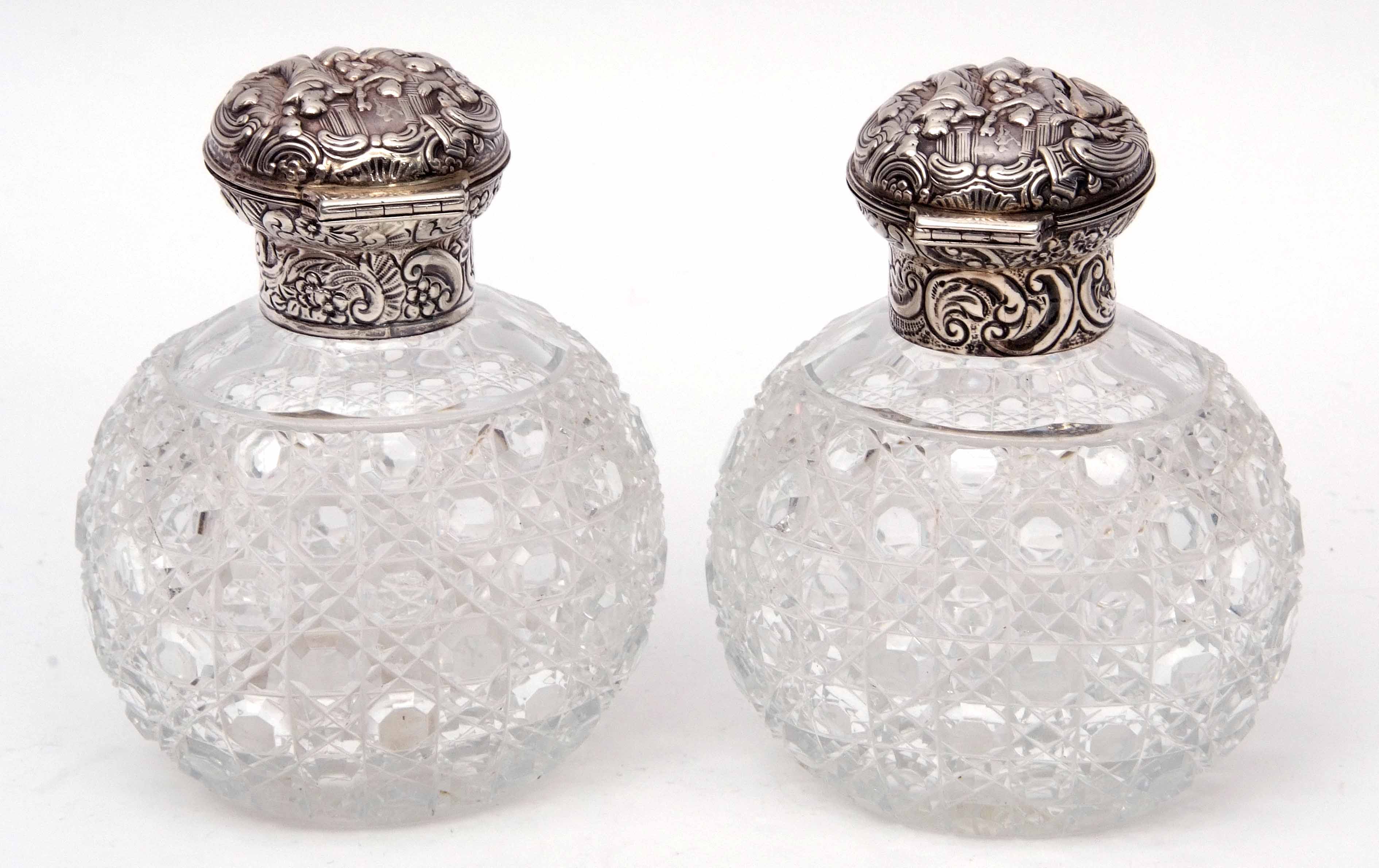 Pair of late Victorian hobnail cut oval glass scent bottles, the hinged lids and collars heavily - Image 3 of 5