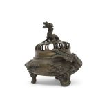 Ming style Chinese bronze censer, the body modelled in relief with a sinuous dragon, the cover