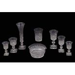 Extensive suite of mid 19th century cut glass wares including champagne flutes, wine glasses,
