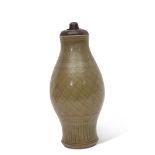 Longquan celadon vase, possibly Ming dynasty, of ovoid form with diamond diaper pattern within a