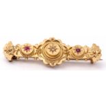 Antique Etruscan diamond and ruby brooch, typically decorated with flowers, beads and scrolls etc,