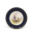 Early 20th century Royal Worcester side plate, the centre painted with sheep in a landscape,