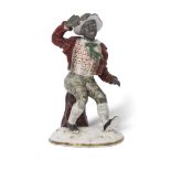 Staffordshire porcellaneous figure inspired by Uncle Tom's Cabin, 16cm high