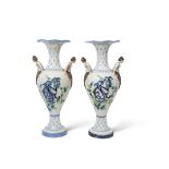Pair of early 20th century Continental pottery vases, the tapered bodies with polychrome