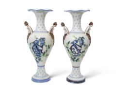 Pair of early 20th century Continental pottery vases, the tapered bodies with polychrome