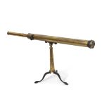 Early 20th century brass astronomical telescope with single draw on tapering brass column to a