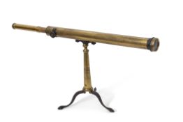 Early 20th century brass astronomical telescope with single draw on tapering brass column to a