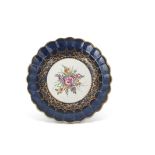 18th century Worcester plate, the gros bleu ground with a gilt design to the centre with floral