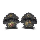 Pair of black lacquered floral decorated letter racks of shaped form, stamped "Jennens &