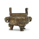 Chinese bronze censer, the handles modelled as stylised dragons heads, the body and base with