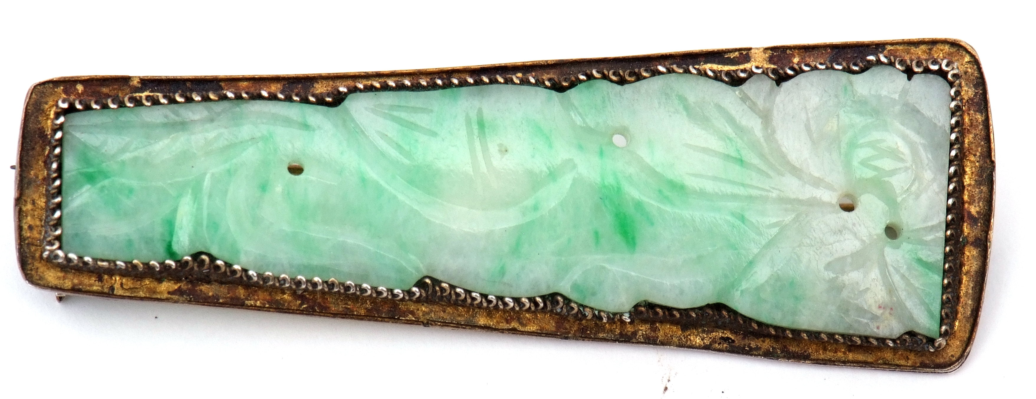 Antique Chinese carved jade brooch, the elongated shaped panel carved with a foliate and squirrel