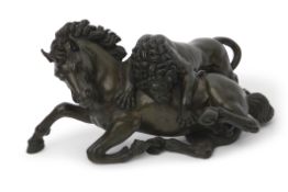 A patinated bronze group of a lion attacking a horse, 30cm wide x 18cm tall (max)