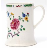 Large Bow porcelain tankard with tapered body and strap handle with heart shaped terminal,