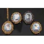 Cased Georgian school four hand painted family miniatures on ivory, two with buckle mounts, one