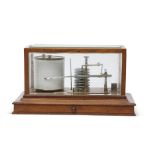 Early 20th century brass barograph with metal bellows housed in a glass panelled mahogany case