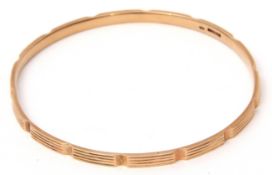 Early 20th century 9ct gold bangle, textured design, Birmingham 1924, 7cm diam, 17.8g