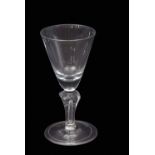 Large 18th century wine/goblet, the bowl sitting on a four-sided pedestal with rounded shoulders and