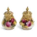 Pair of Royal Worcester pot pourri vases with gilt reticulated covers, painted with roses, one