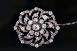 Victorian diamond brooch/pendant, circa 1880, of open work design, the old brilliant cut diamond