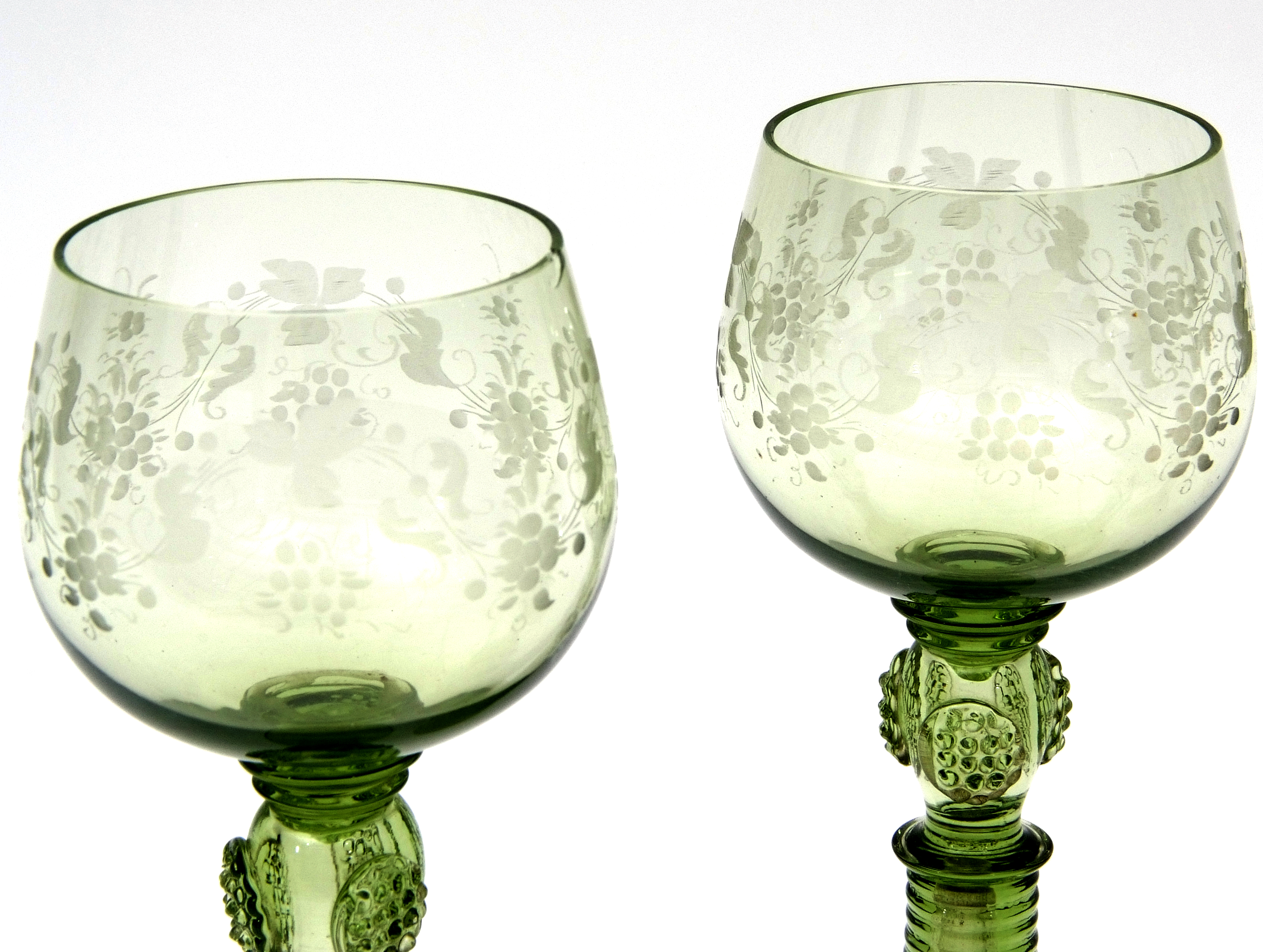 Group of seven Bohemian wine glasses, the bowls engraved with a fruiting vine design above a stem - Image 4 of 5