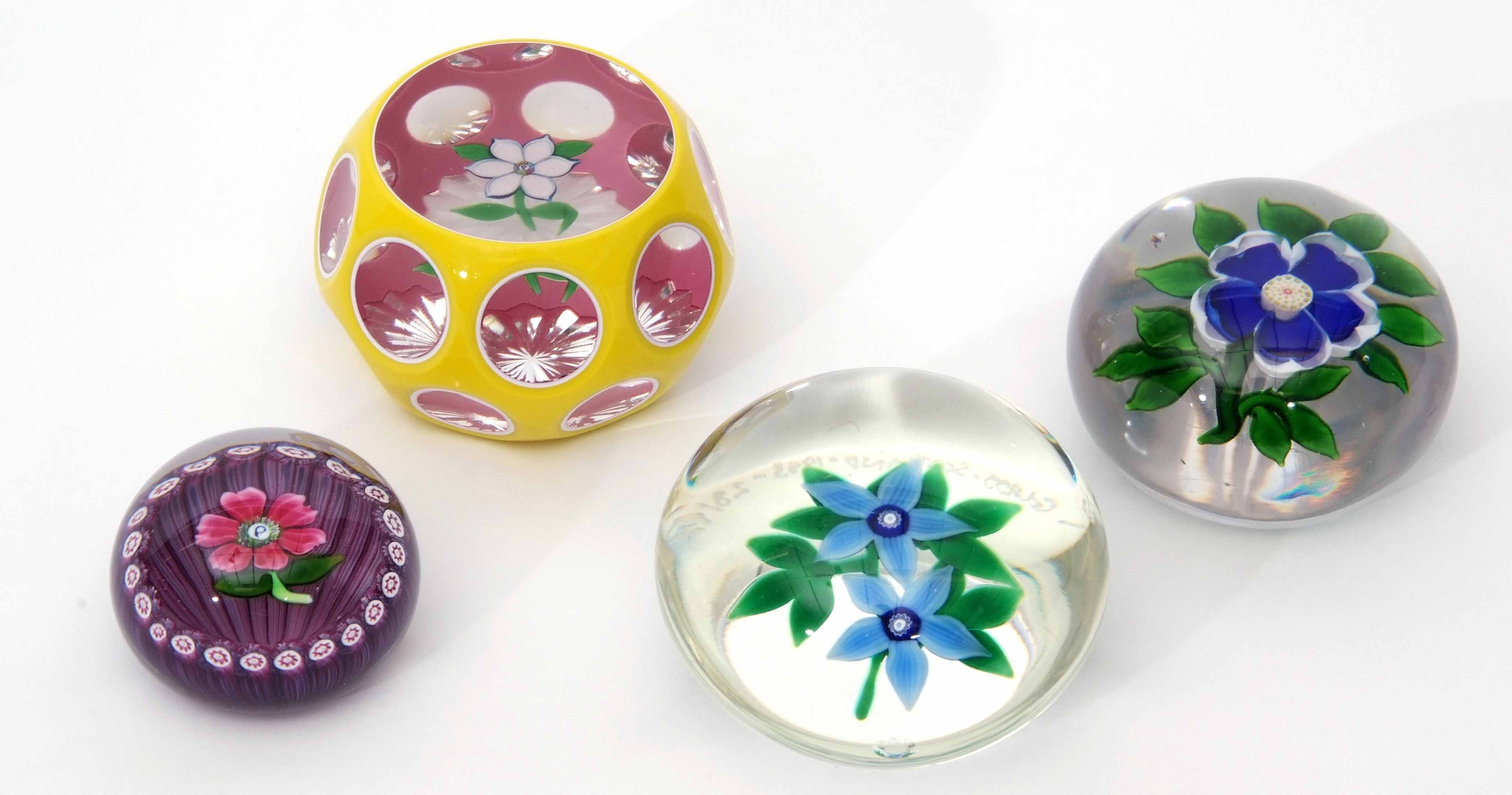 Group of four paperweights including a Baccarat primrose weight with a blue flower with white - Image 7 of 8