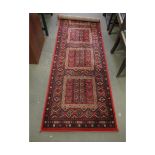 MODERN RED GROUND FLOOR RUNNER WITH GEOMETRIC DESIGNS