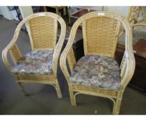 BAMBOO FRAMED PAIR OF ARMCHAIRS WITH FLORAL CUSHION AND FURTHER GLASS TOPPED TABLE (3)