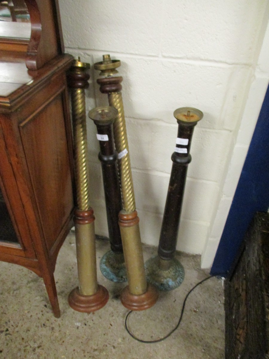 TEAK AND BRASS TWISTED COLUMN LAMP AND TWO FURTHER TURNED COLUMN LAMPS WITH BRASS BASES (4)
