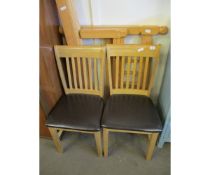 PAIR OF MODERN OAK FRAMED BROWN REXINE UPHOLSTERED DINING CHAIRS AND A SINGLE PINE BED FRAME