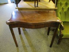 GEORGIAN MAHOGANY SERPENTINE FRONTED FOLD OVER CARD TABLE WITH GREEN BAIZE LINED INTERIOR ON