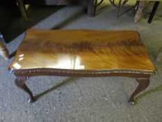 REPRODUCTION MAHOGANY RECTANGULR COFFEE TABLE RAISED ON PAD FEET