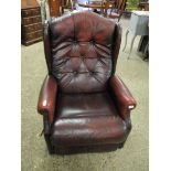 AN OX-BLOOD LEATHER AND BUTTON BACK RECLINER LAZYBOY ARMCHAIR