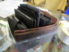 SMALL TUB CONTAINING LEATHER WALLETS