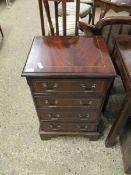 REPRODUCTION MAHOGANY BACHELOR'S CHEST WITH FOUR FULL WIDTH DRAWERS RAISED ON BRACKET FEET