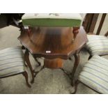 EDWARDIAN WALNUT OCCASIONAL TABLE WITH SHAPED HEXAGONAL FORM ON FOUR CARVED AND SHAPED LEGS