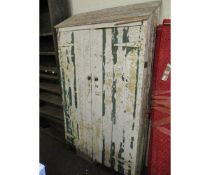 VICTORIAN PINE PAINTED CUPBOARD WITH SLOPED TOP AND TWO CUPBOARD DOORS WITH BRASS BUTTON HANDLES