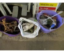TWO TUBS AND A BAG CONTAINING FISH TANK ROCKS, ROOTS ETC